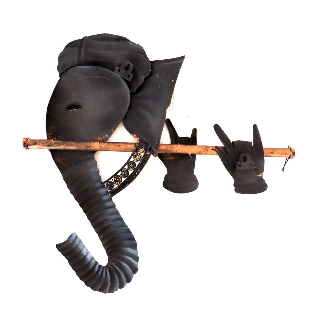 Ganesh holding bansuri