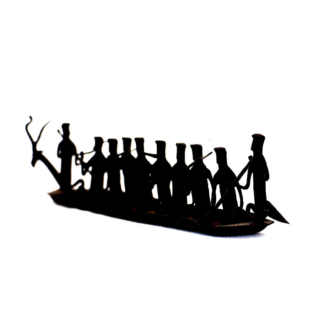 Tribal group with boat figurine